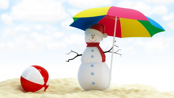 Прикольные обои снеговика в пустыне под зонтиком