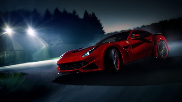 Заставка с шикарным, красным Ferrari