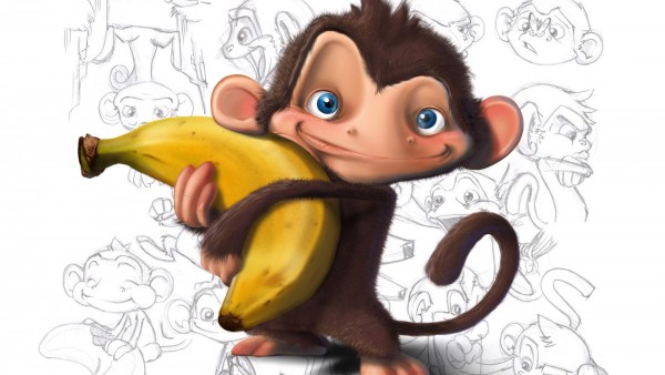 обезьяна держит банан