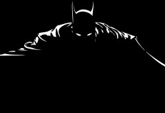 Образ Бэтмана на черном фоне