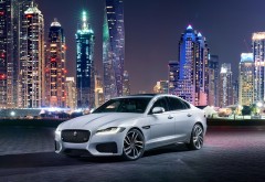 2016 Jaguar XF автомобиль в ночном городе
